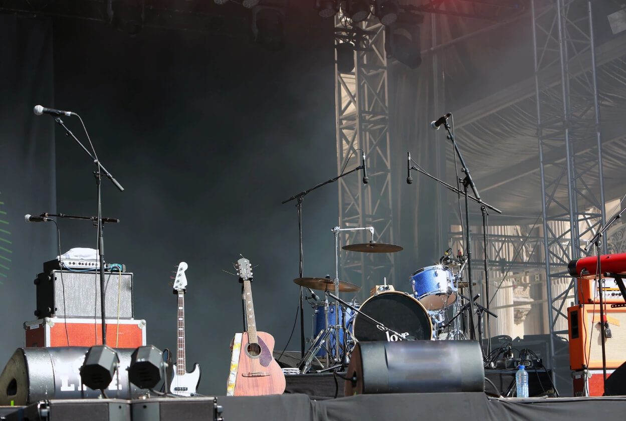 A stage with many different types of musical instruments.
